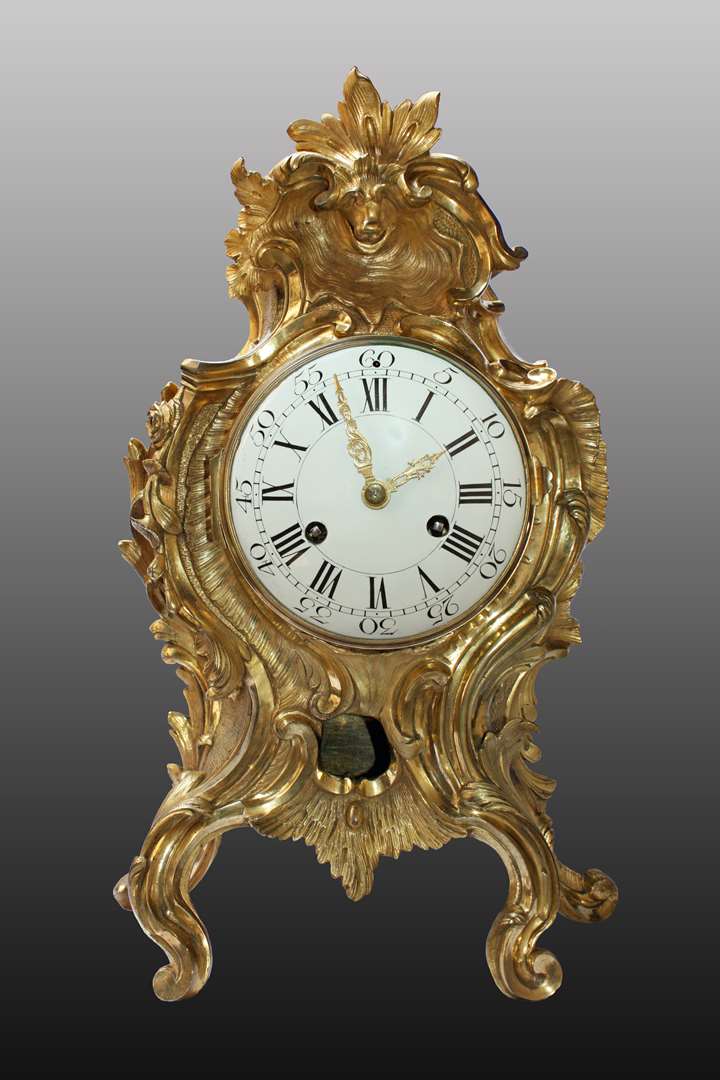 A large Louis XV ormolu-clock by Jean-Baptiste Baillon